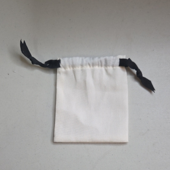 Kate Spade Cream Pouch with Black Ties - Picture 2 of 2